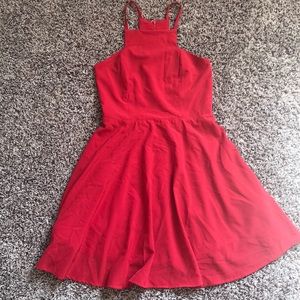 Stunning Red Dress with beautiful back detail.